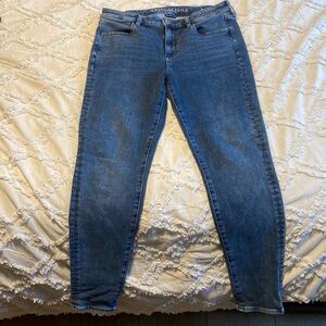 American eagle superstretch skinny Jean blue gray color size 10 regular